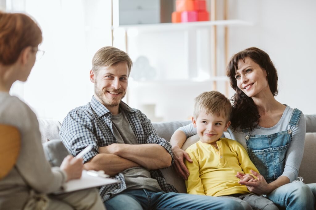 young couple with child and therapist
